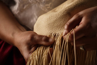Woman weaving Straw